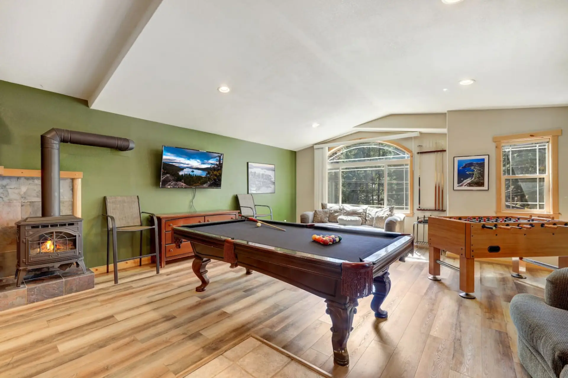 Game room with pool table and foosball