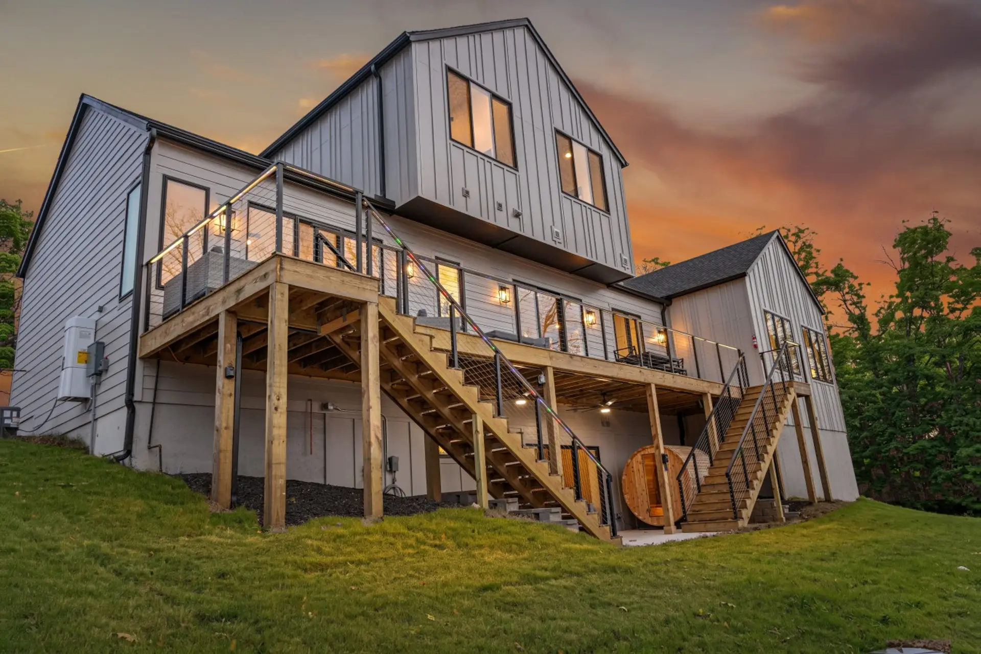Side exterior view showcasing the multi-level deck architecture.