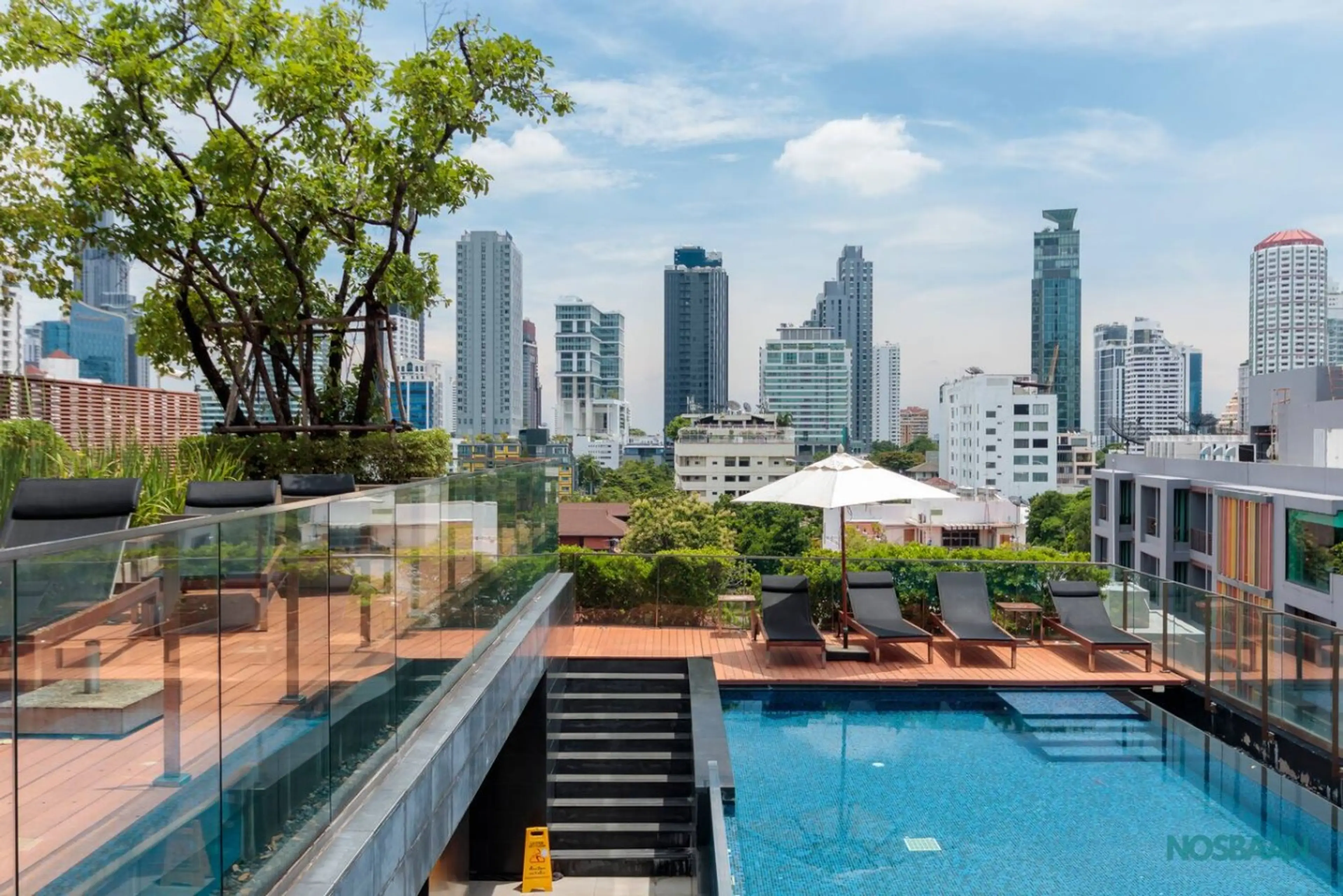 Stunning rooftop swimming pool boasting breathtaking panoramic views.
