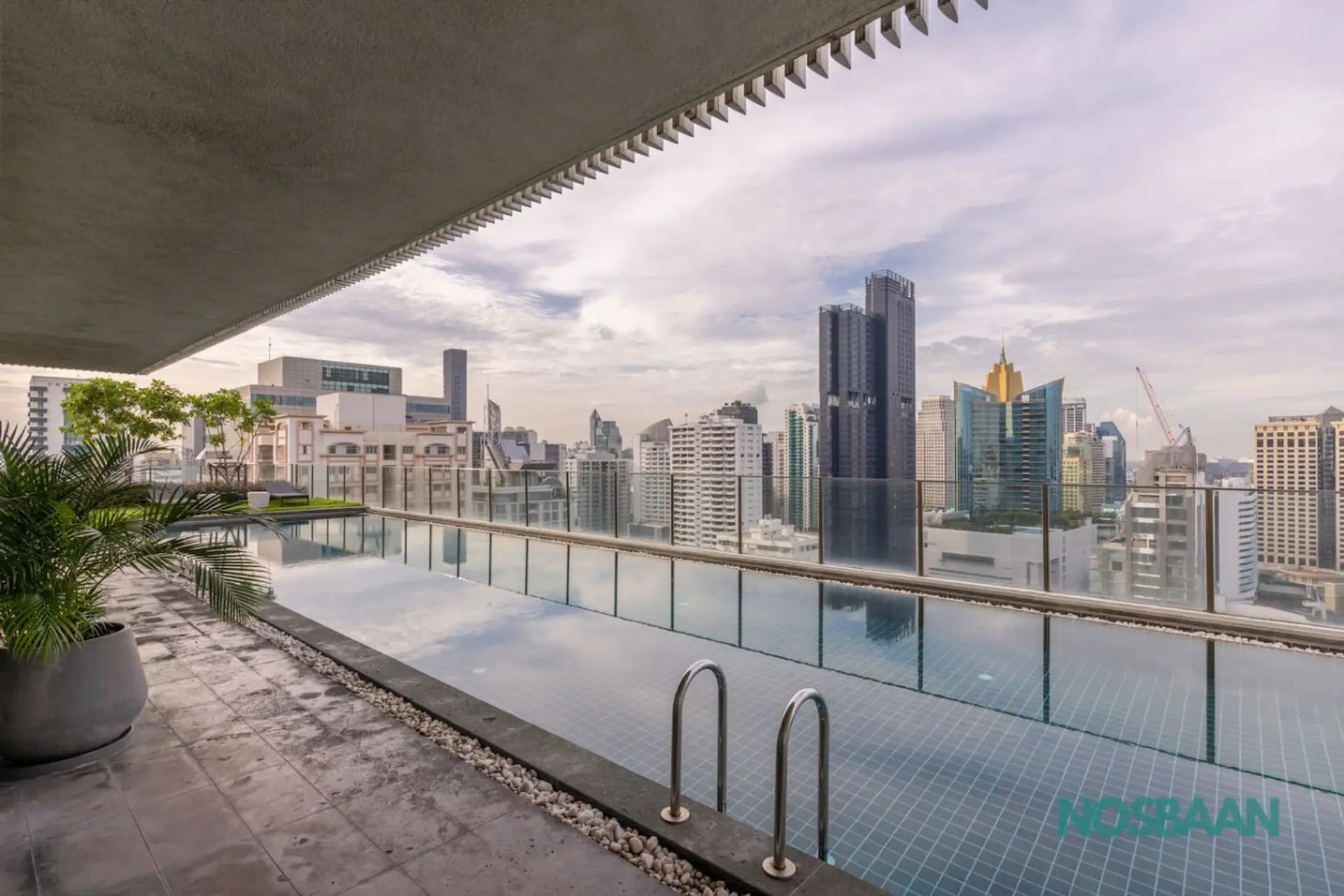 Rooftop swimming pool with panoramic city views on the 28th floor