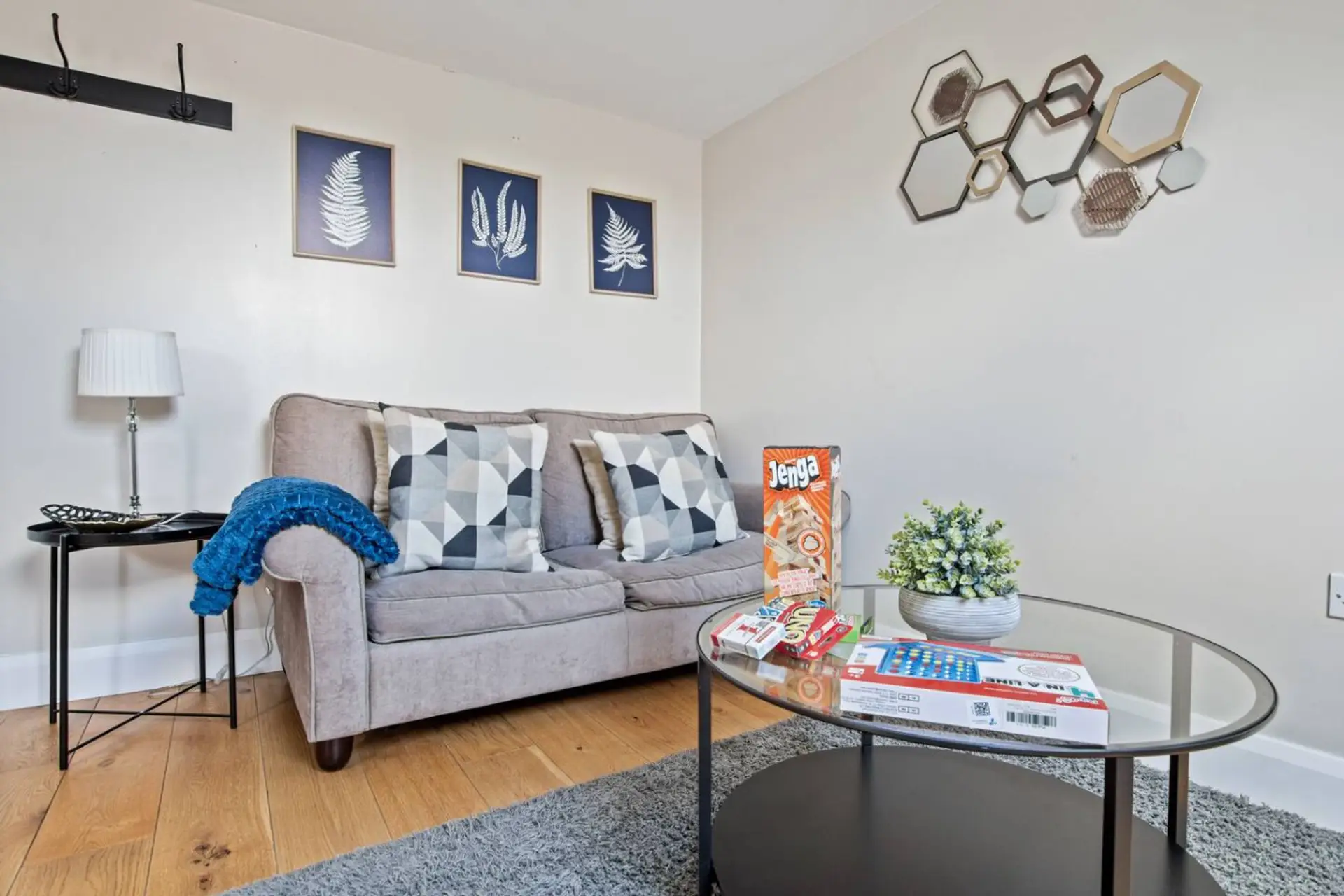 Living room with sofa, TV and games
