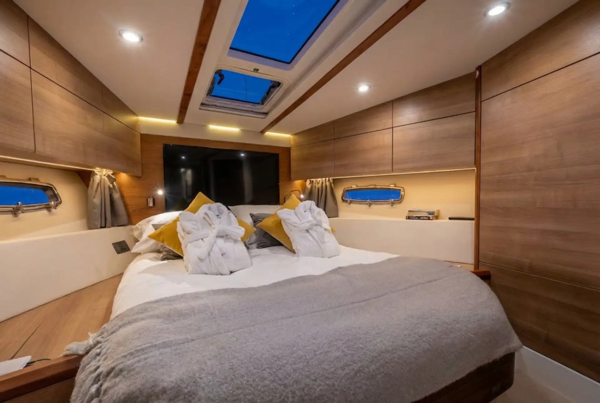 Wake up under the stars through the skylight in the double cabin.