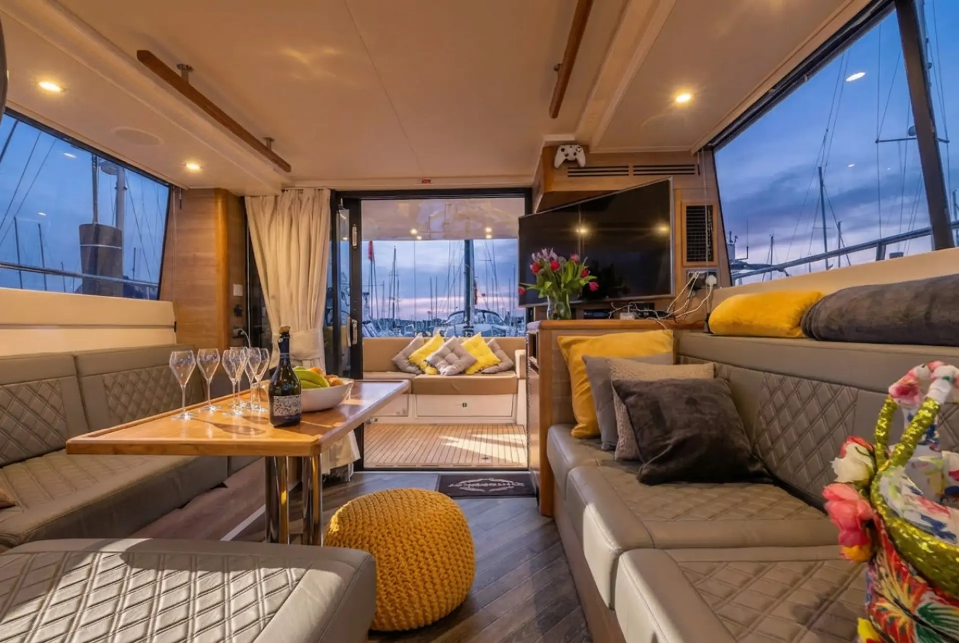 Champagne evenings in the main saloon with marina views all around.