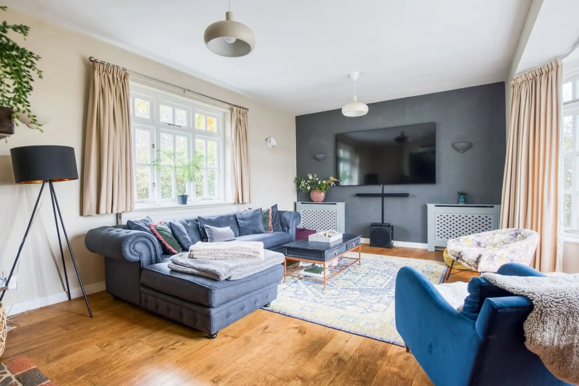 Cinema room with large seating area and TV to sit back and relax