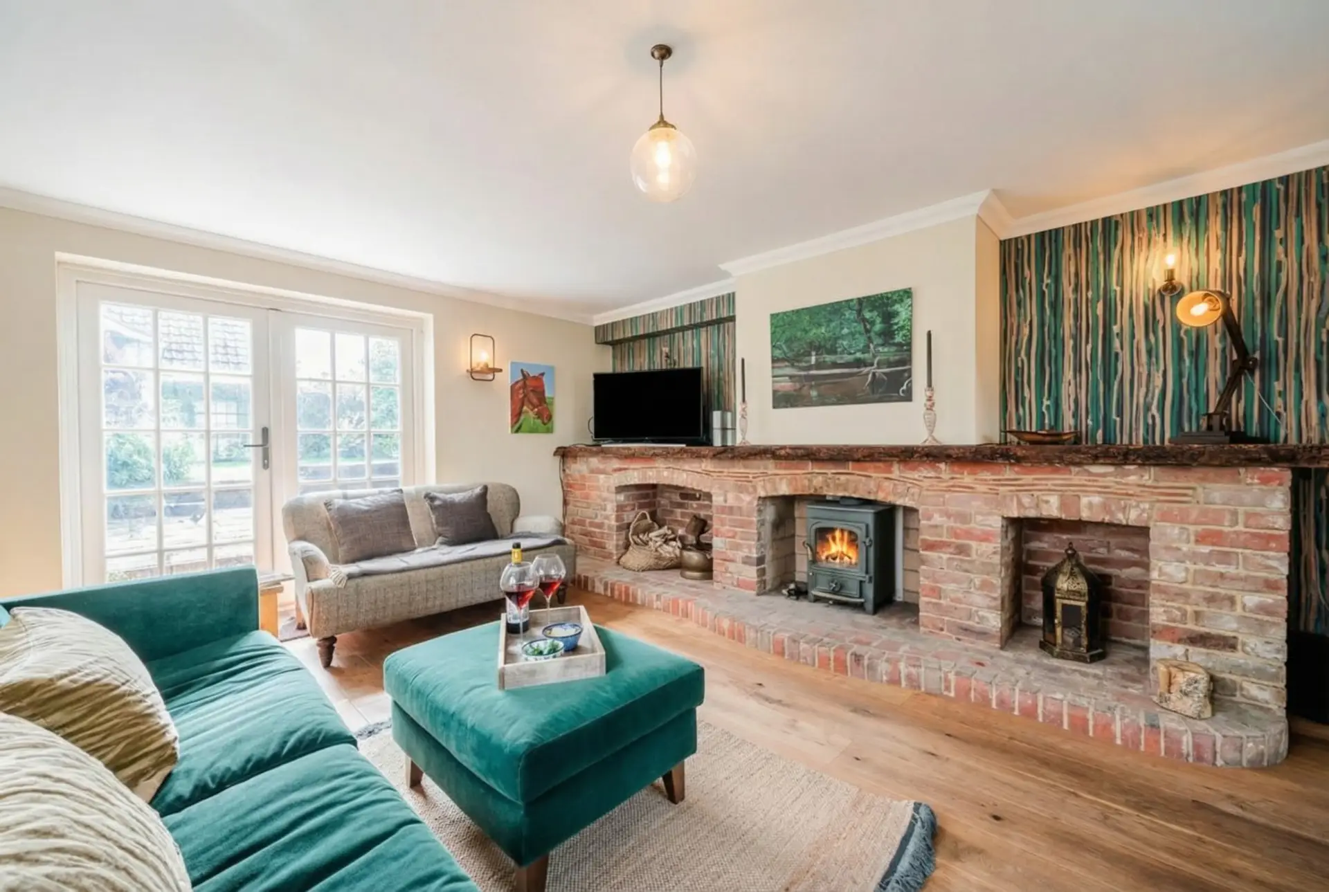 Curl up beside a crackling log burner with a glass of wine on a cosy evening in.