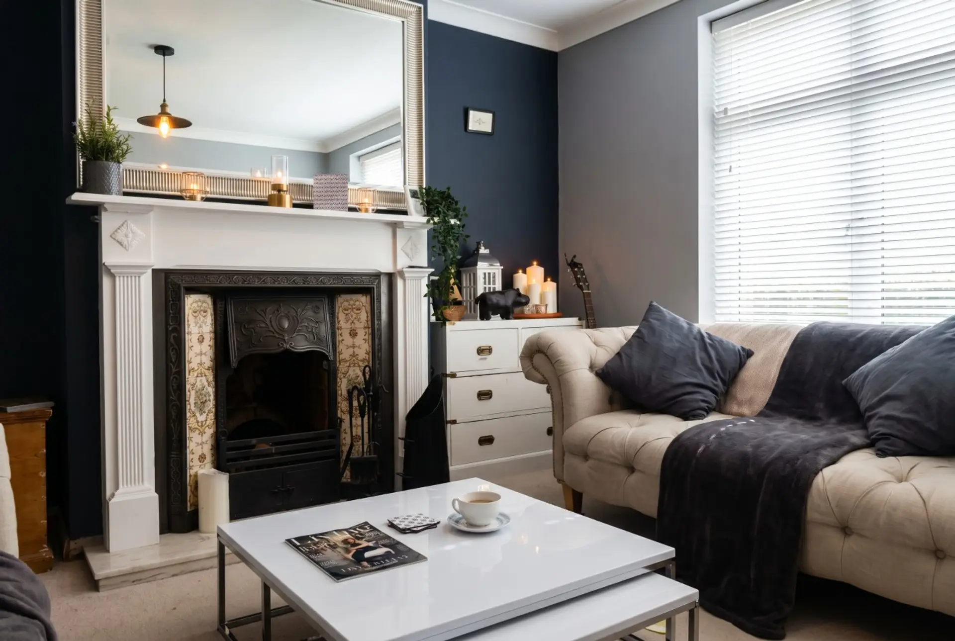 Sink into the chesterfield sofa by the original fireplace, coffee in hand.