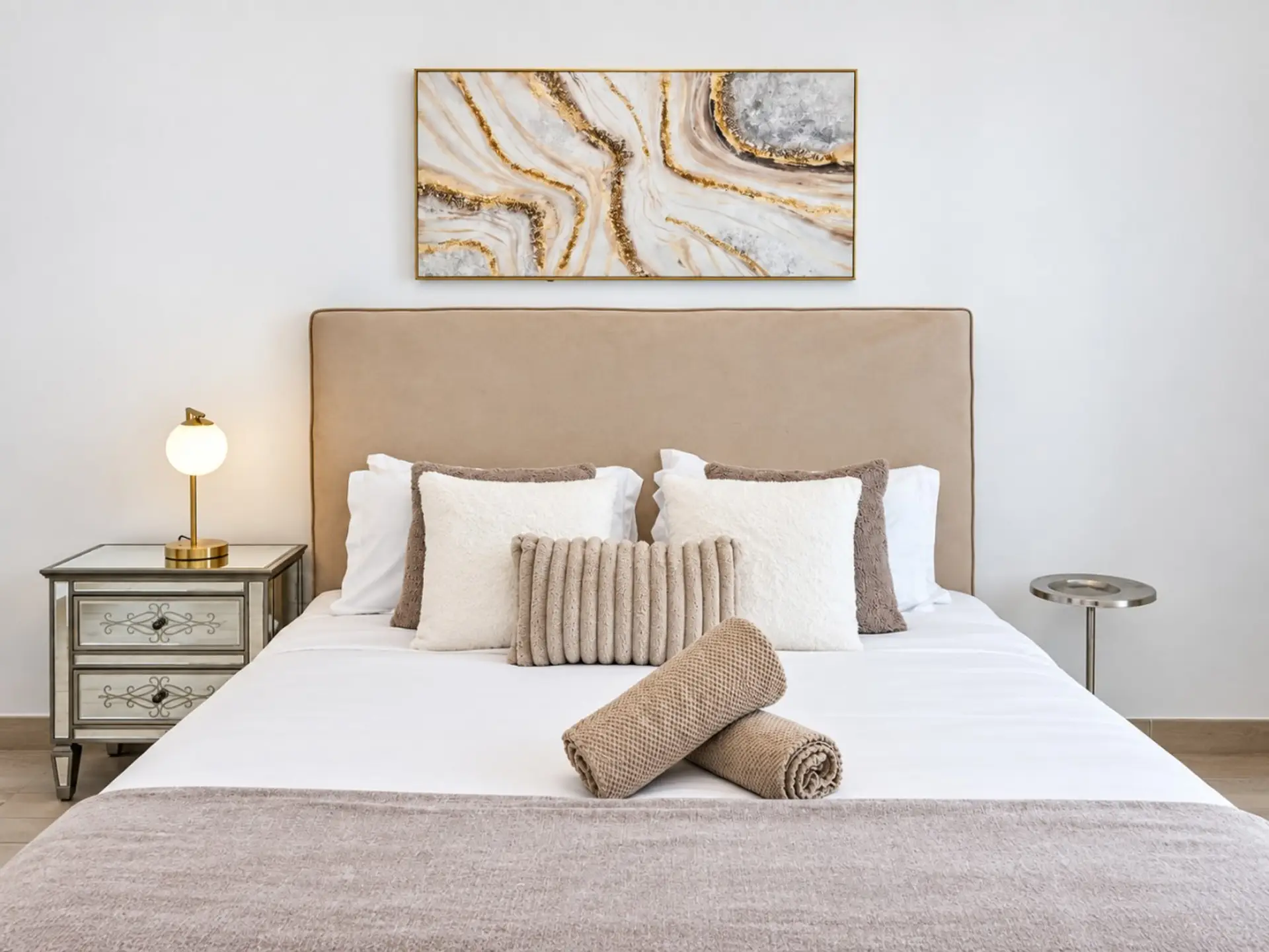 A calm and comfortable main bedroom made for a restful night’s sleep.