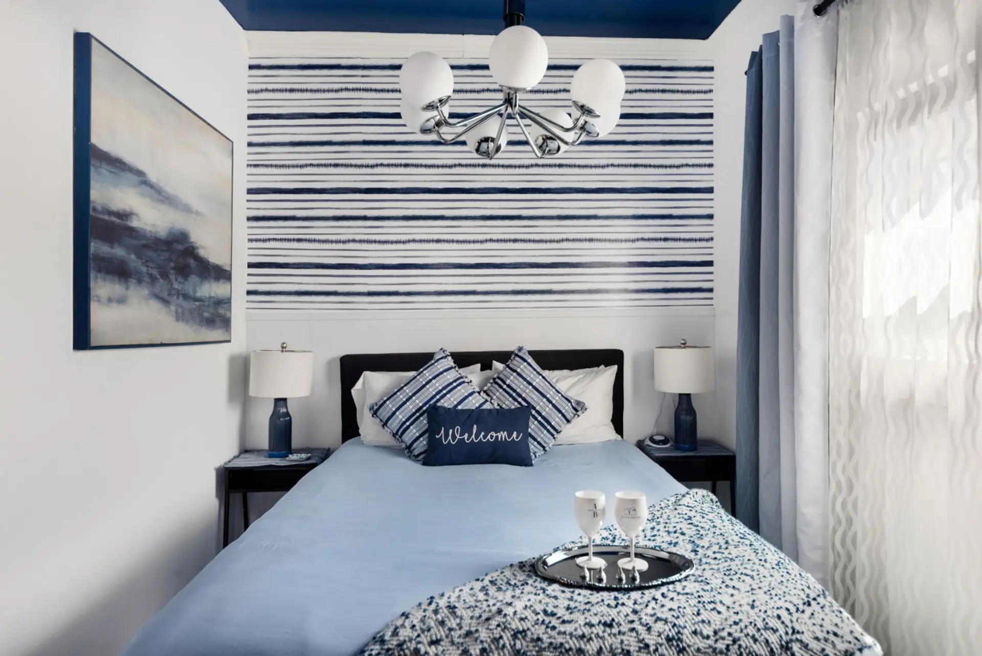 Quiet peaceful bedroom in a lively neighborhood. New Beauty rest mattress. Fluffy pillows and comforter. Blackout curtains. White noise machine. Fans upon request. Apple closets with iron, iron board, steamer, and plenty of space for luggage and belonging