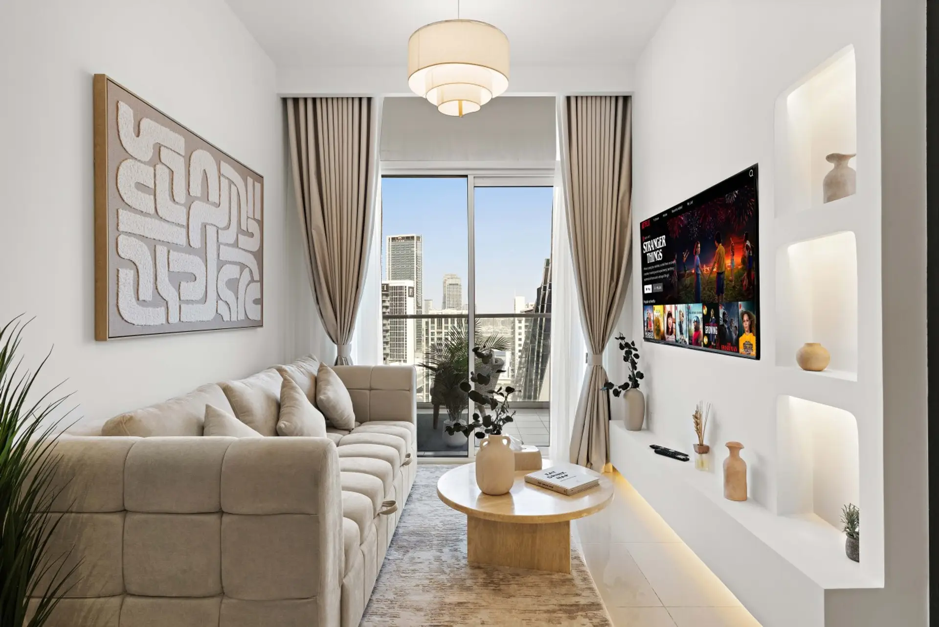Living Room: Relax in our stylish space featuring a sofa, free Netflix, high-speed internet, centralized air conditioning, and access to a private balcony.