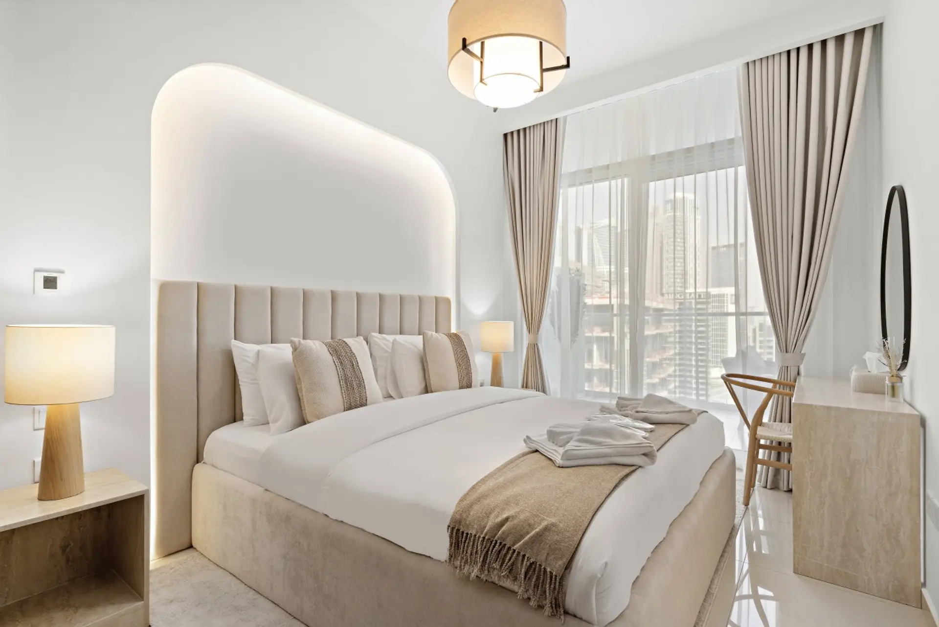King-size bed with a vanity table that can also be used as a dedicated workstation—perfect for digital nomads and guests working remotely while enjoying a comfortable stay.