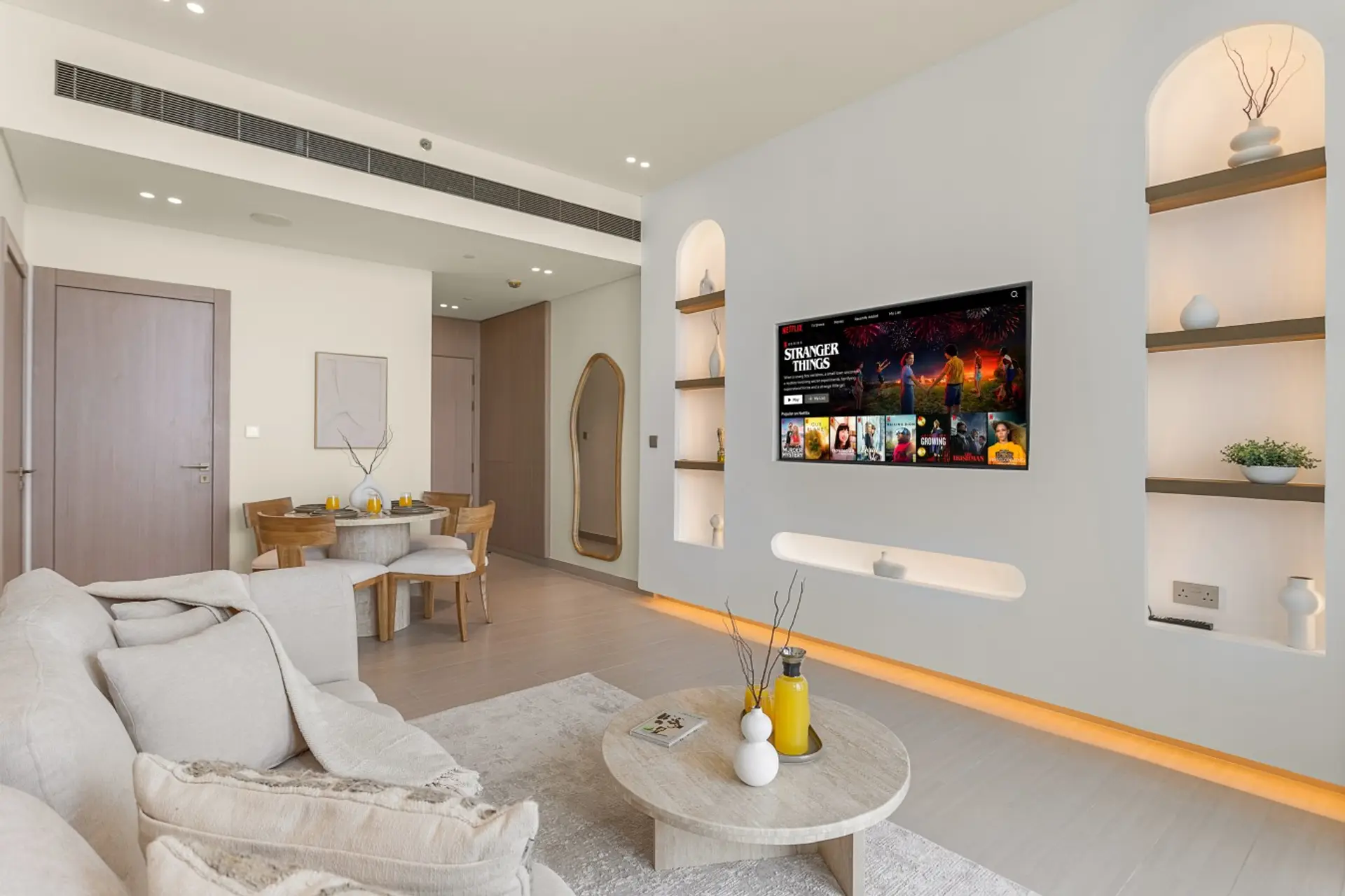Living Room: Relax in our stylish space featuring a comfortable sofa that converts into a sofa bed, free Netflix, high-speed internet, and centralized air conditioning.