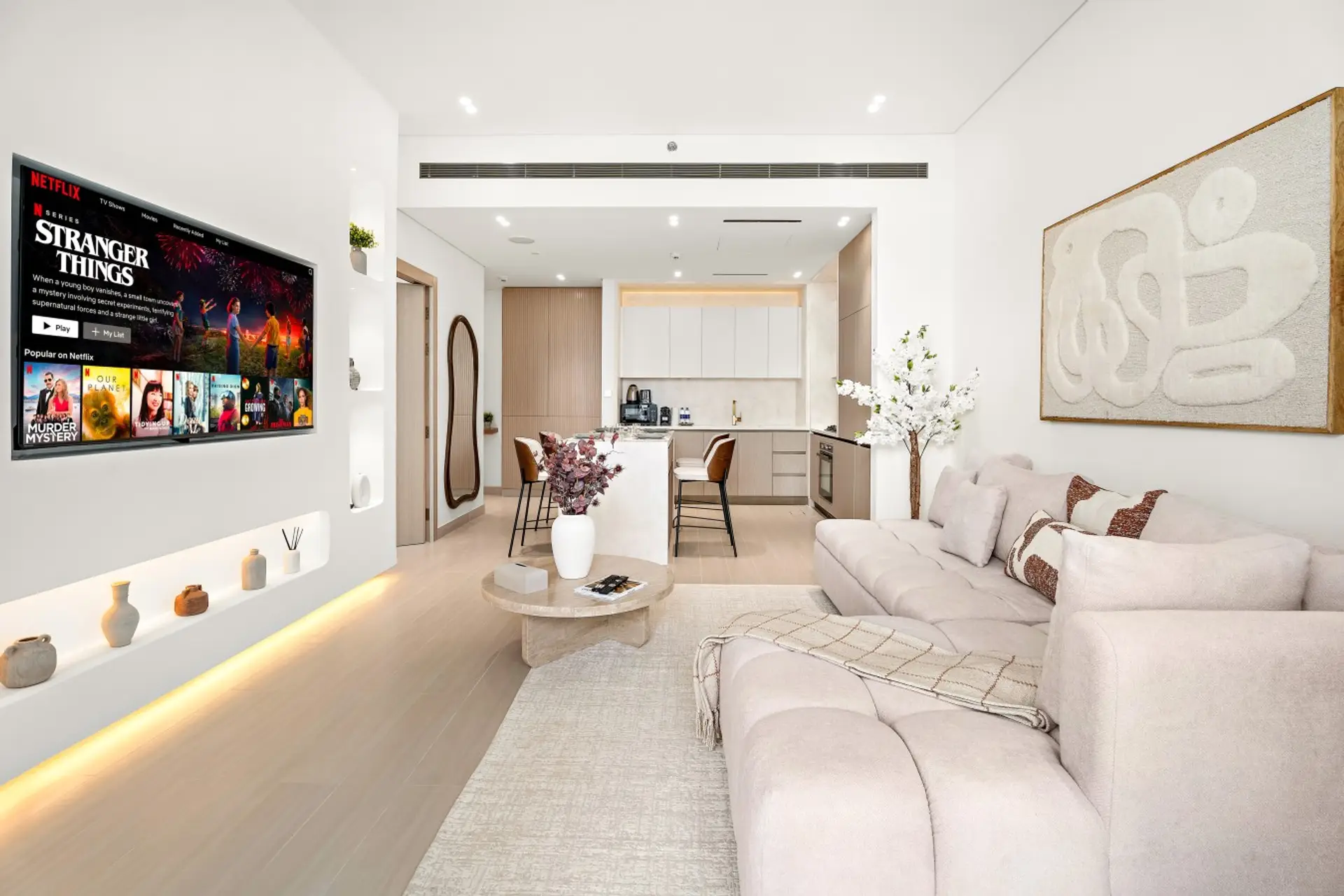 Living Room: Relax in our stylish space featuring a comfortable sofa that converts into a sofa bed, free Netflix, high-speed internet, and centralized air conditioning.