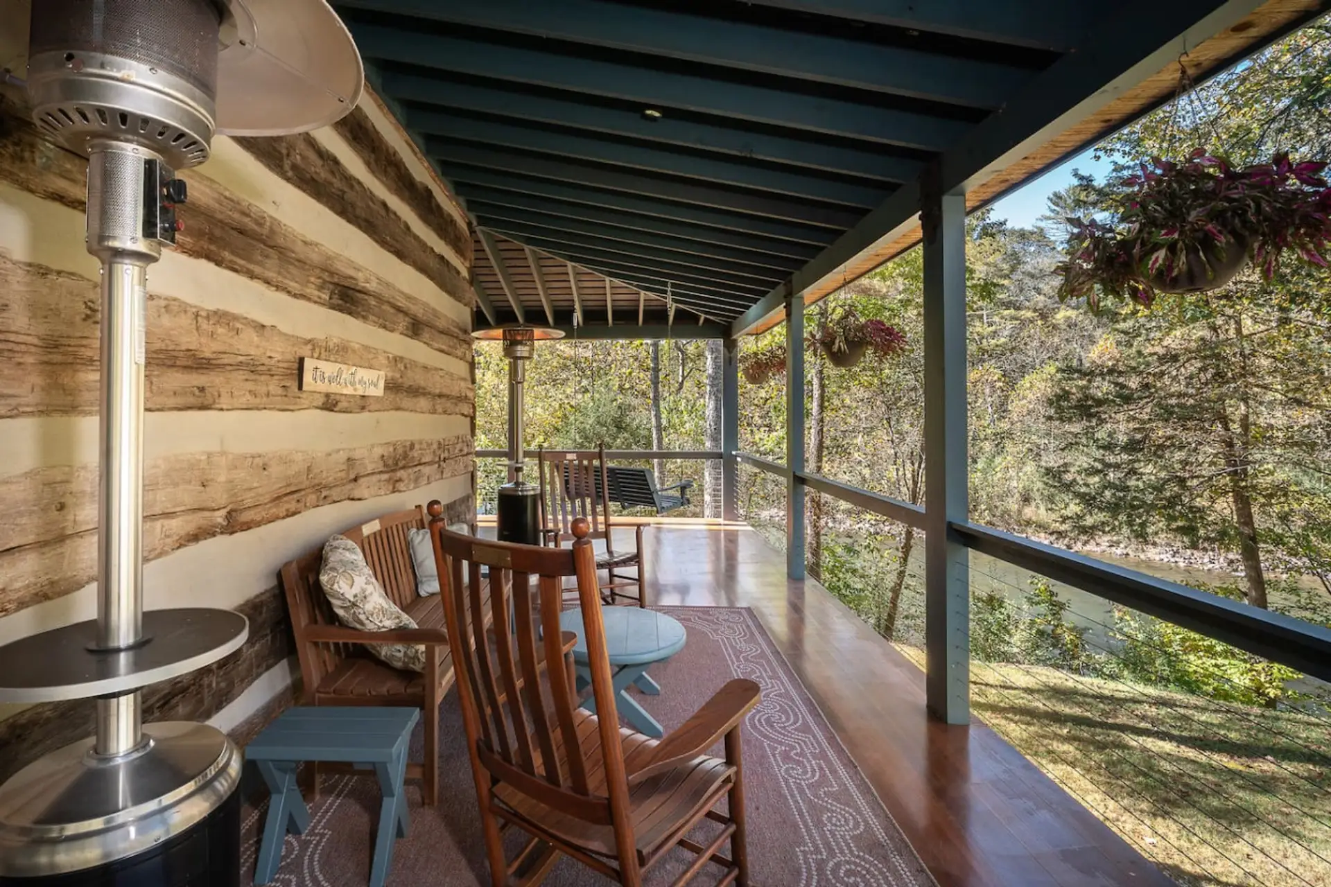 Main Level Side Porch with Chairs – Perfect Spot to Unwind and Enjoy Nature’s Breeze